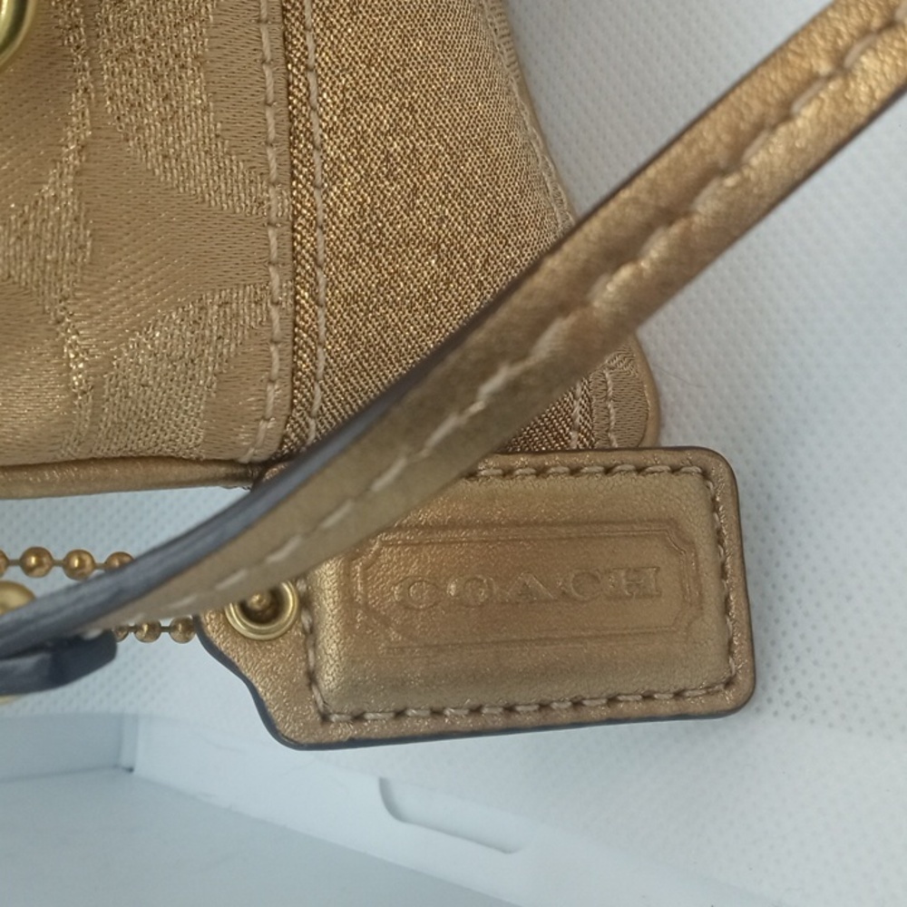 COACH SIGNATURE STUD WRISTLET - Picture 4 of 10